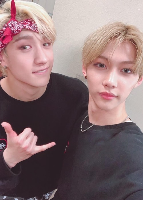 Bang Chan (Left) as seen while posing for a selfie along with his 'Stray Kids' bandmate, Felix, in April 2019
