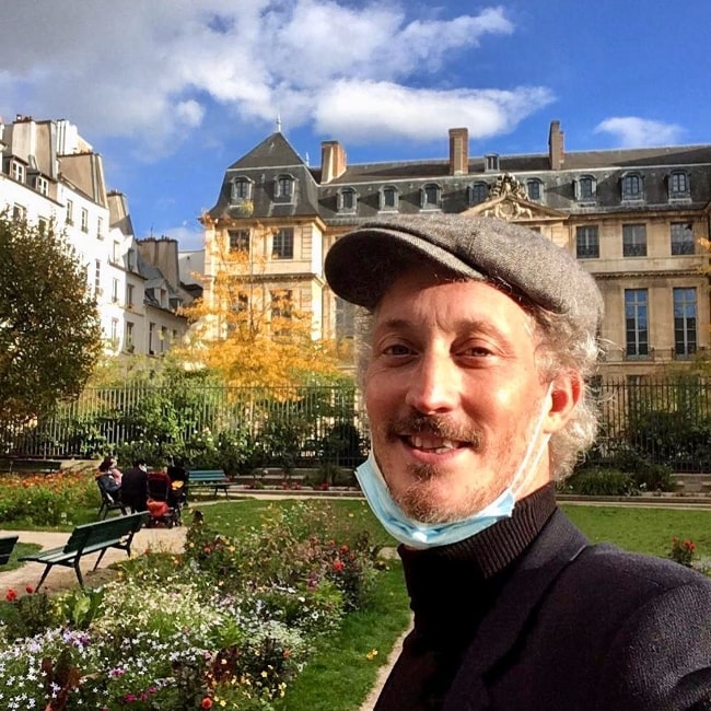 Bruno Gouery as seen while smiling in a selfie in Marais District in October 2020