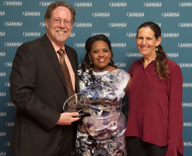 Chandra Wilson (Center) posing backstage alongside the director and writers of the documentary, Mind-Game, Rick Goldsmith & Sharon Wood, after being collectively honored with a 2015 Voice Award