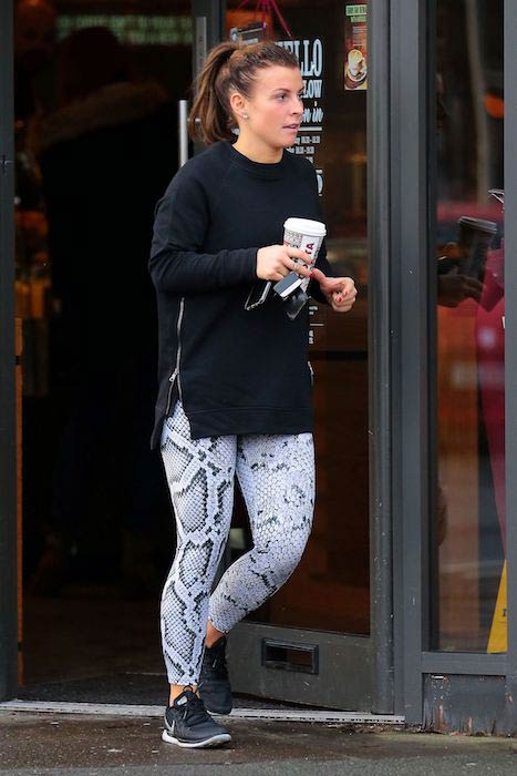 Coleen Rooney grabbed a Costa Coffee cup on the go in Wilmslow Cheshire on December 30, 2016