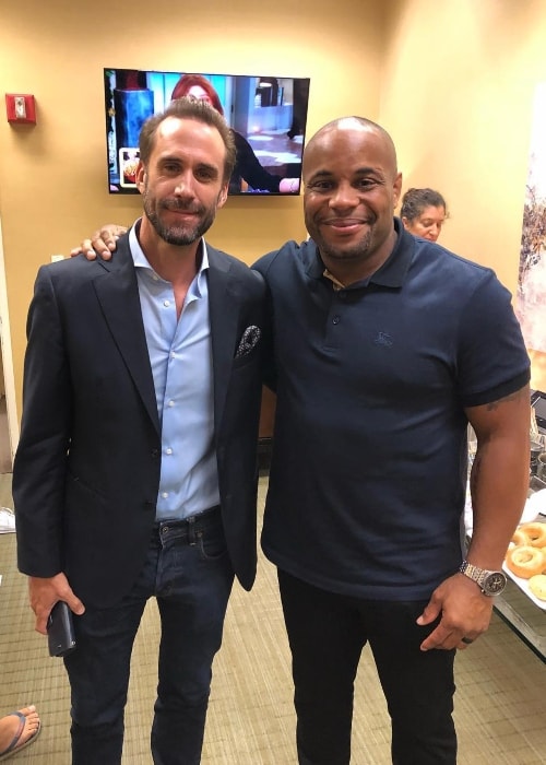 Daniel Cormier with Joseph Fiennes in July 2018