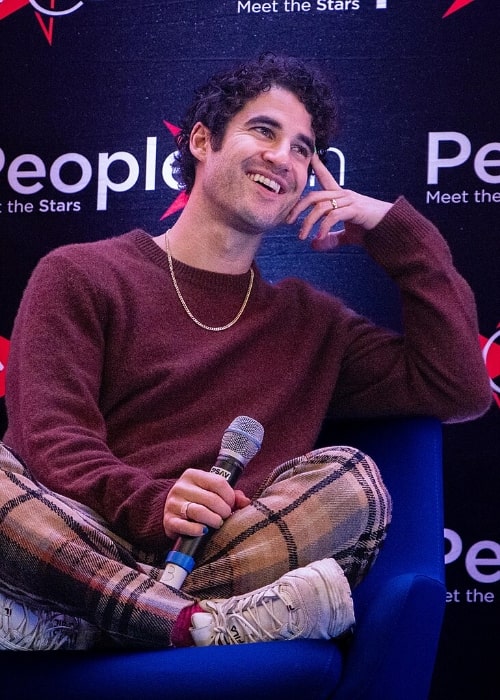 Darren Criss conversing during his a Glee panel convention in Paris in 2023