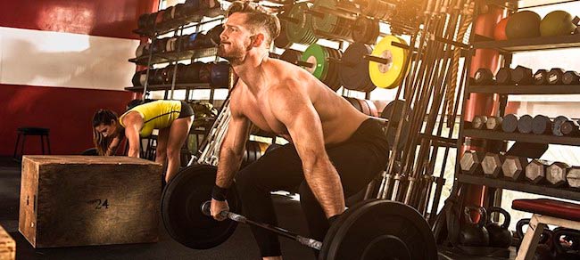 David Kingsbury doing deadlifts in the gym