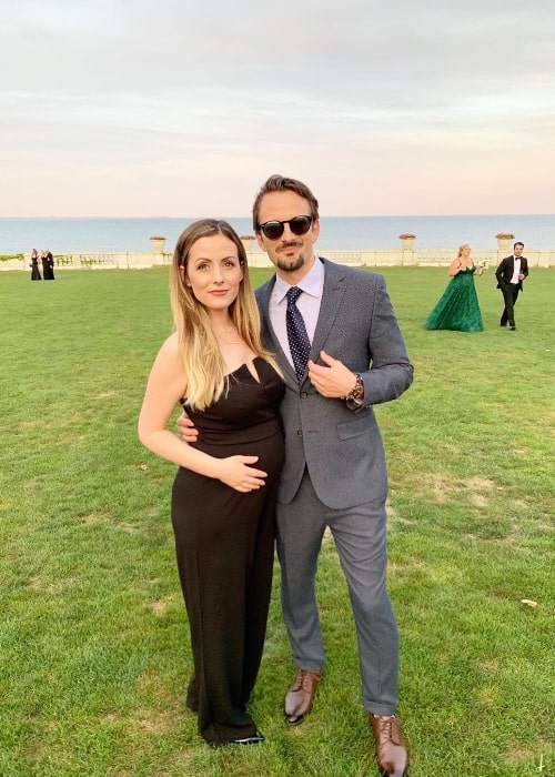 Evan Bass posing for a picture alongside Carly Waddell in August 2019