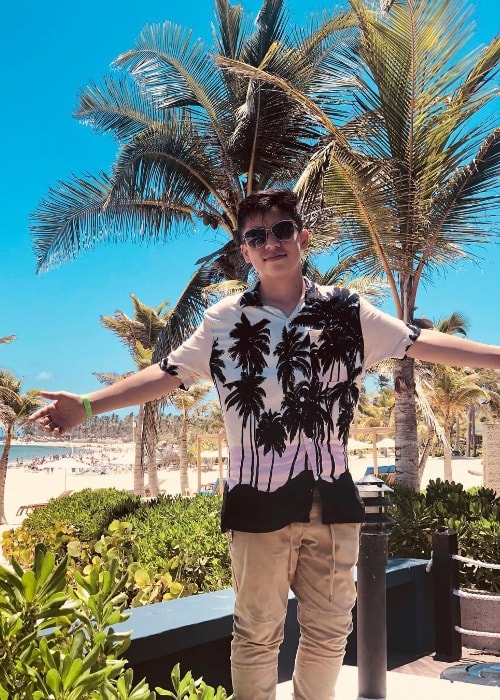 Freddy Pomee as seen while posing for a picture with a stunning backdrop in Punta Cana, Dominican Republic in August 2018