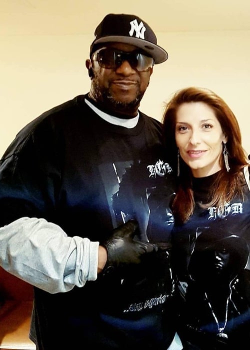 Kool G Rap posing with a fan in June 2018