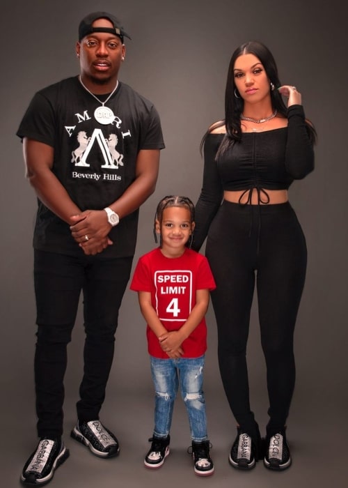 Kyrie Prince as seen in a picture that was taken with his mother Biannca Prince and father Damien Prince in December 2020