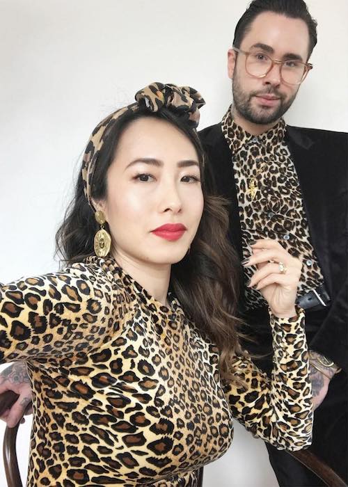 Melissa Leong with friend wearing leopard print dresses in September 2018