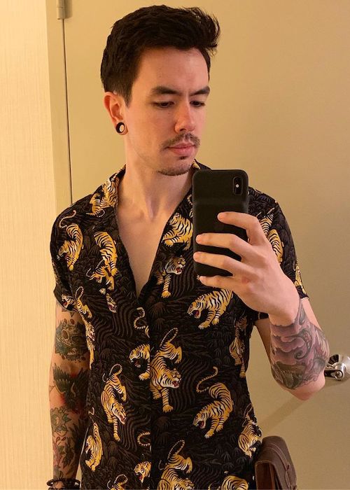 NateWantsToBattle in a mirror selfie in June 2019