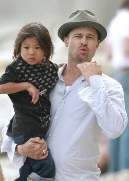 Pax Jolie-Pitt as seen in the arms of his father