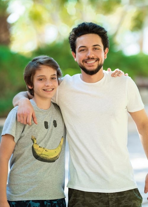 Prince Hashem bin Abdullah (Left) as seen while smiling for a picture along with his brother Hussein, Crown Prince of Jordan
