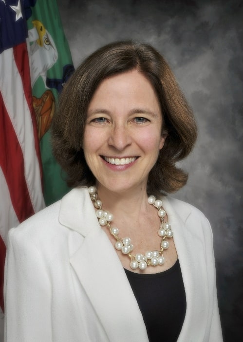 Sarah Bloom Raskin as seen while smiling in her official portrait as the United States Deputy Secretary of the Treasury in 2014