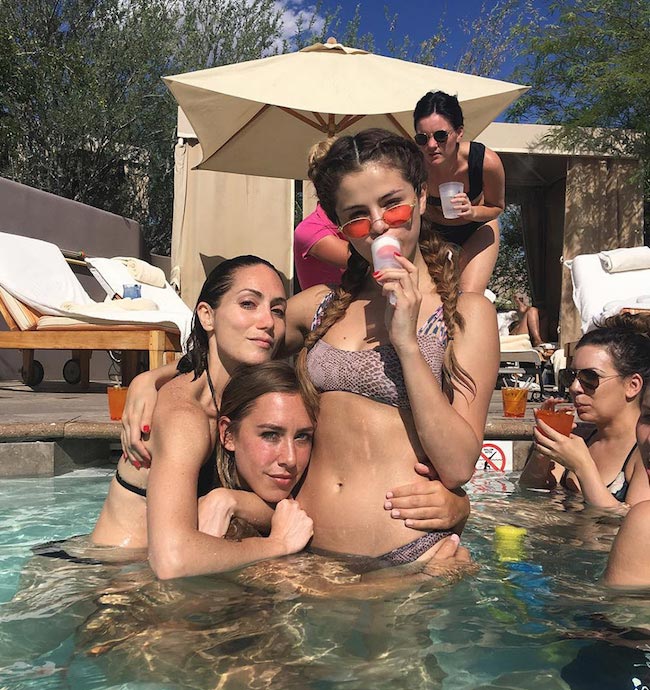 Selena Gomez with Amy Rosoff Davis in the swimming pool