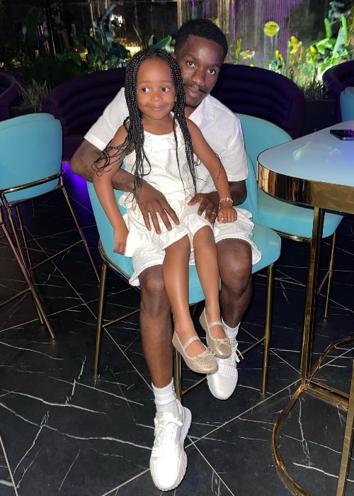 Tinchy Stryder with his daughter in August 2023