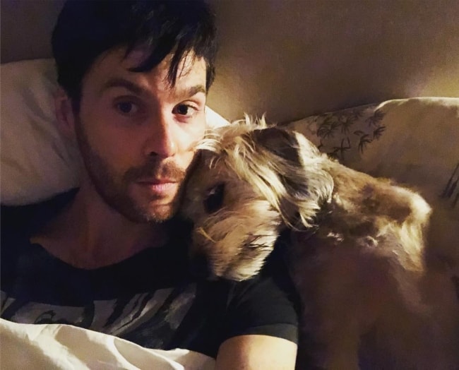 Tom Riley taking a selfie with his dog in May 2018