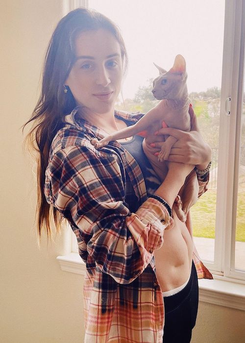 Trevi Moran holding her cat named Poppy in March 2021